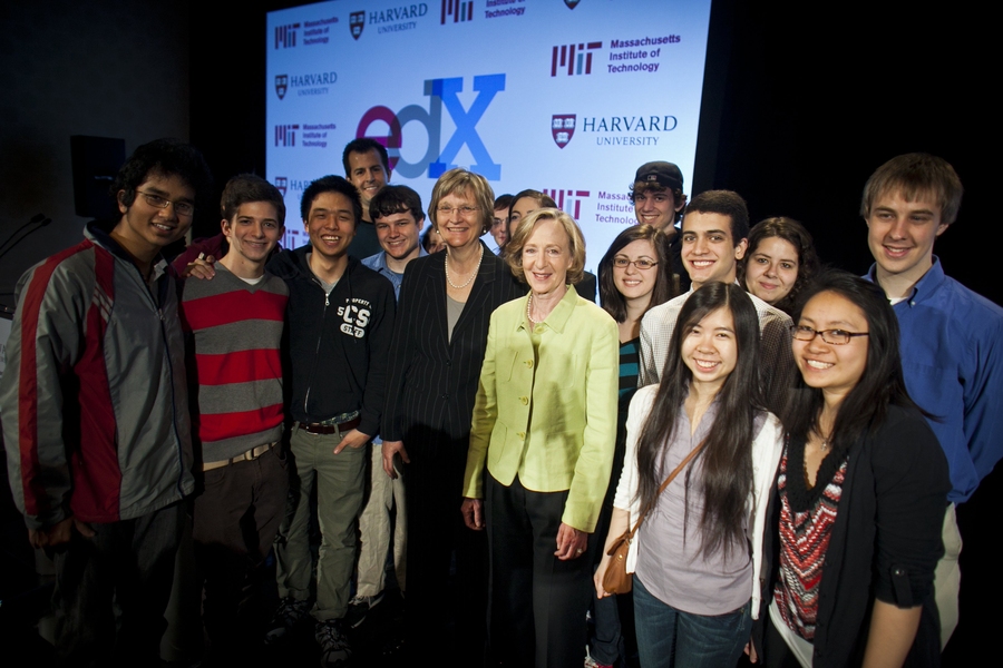 MIT President Susan Hockfield (in green) and Harvard President Drew Faust are joined by students from both universities at the edX announcement.