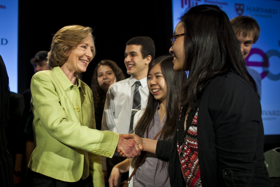 MIT President Susan Hockfield greets students from MIT and Harvard, including Harvard student Joy C. Ming '15.