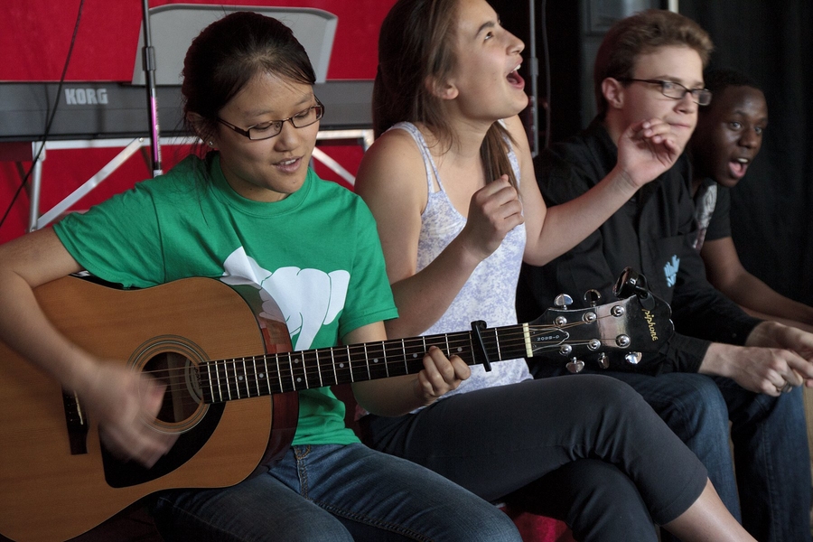 Students rehearse for a talent show at Next House, one of many performances throughout the weekend. From left: Karen Hao '15, Kristina Presing '15, Colin Beckwitt '13, and Joseph Chism '15. 