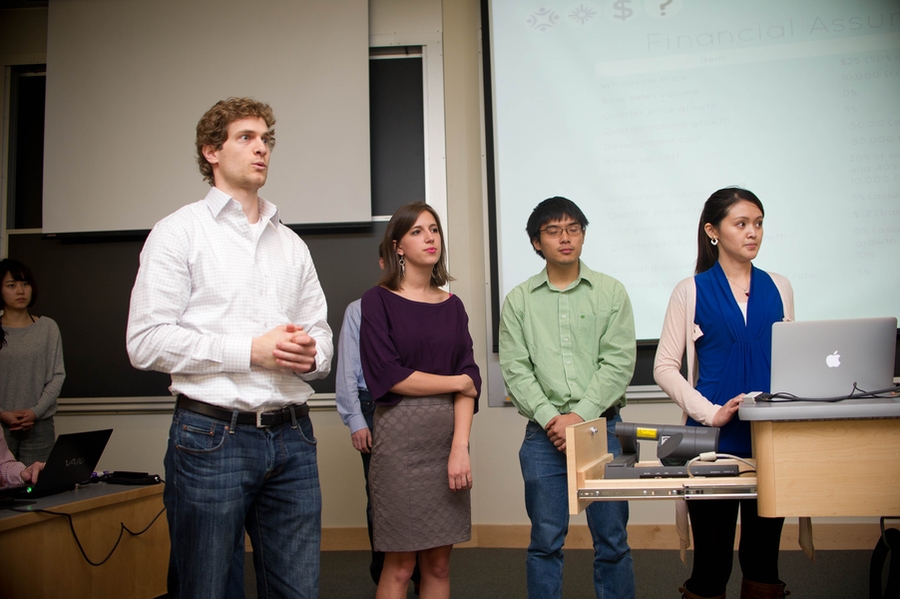 A team of students from MIT's School of Engineering and Sloan School of Management and from RISD defend their design of a laundry hamper/backpack hybrid to reviewers from the product development and venture capital communities.

From left to right: Esther Lee (MIT Leaders for Global Operations, or 'LGO'), Kurtis Mckenney (LGO), Beth Soucy (RISD), Peter Tia (mechanical engineering), P...