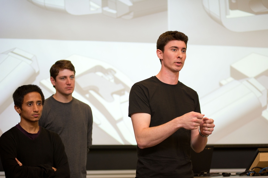 David Linders, a student in LGO, describes design features of a new, quick release bicycle lock invented by his team of students.

From left to right: Tejas Inamdar (mechanical engineering), Cullen Johnson (LGO), David Linders (LGO)