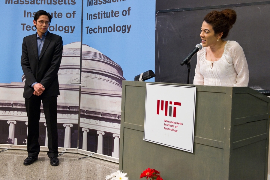 Dean for Graduate Education Christine Ortiz presents the Goodwin Medal to Adrian Chi-Yan Liu. 
