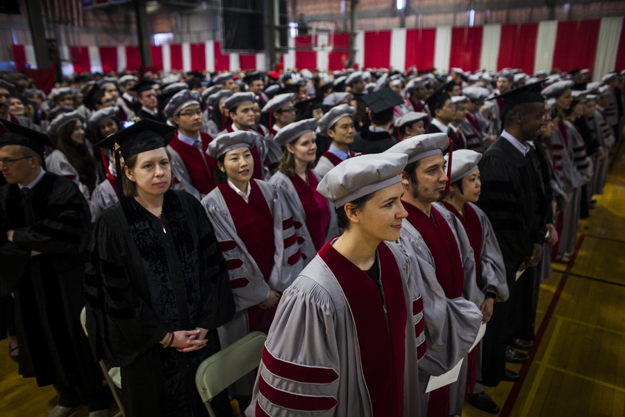 Doctoral students wait for the ceremony to begin in Rockwell Cage.