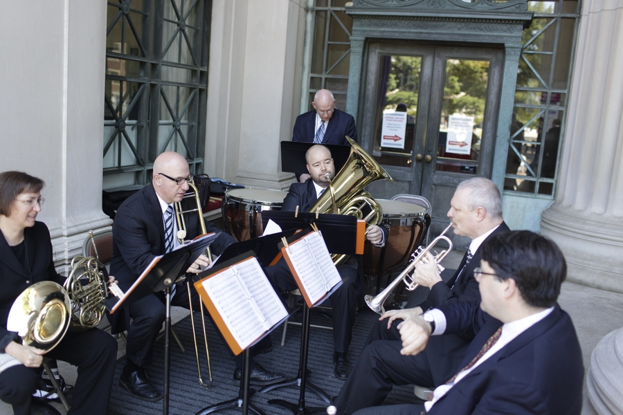 MIT musicians play outside of Lobby 7 as administrators and faculty prepare to march into Killian Court.