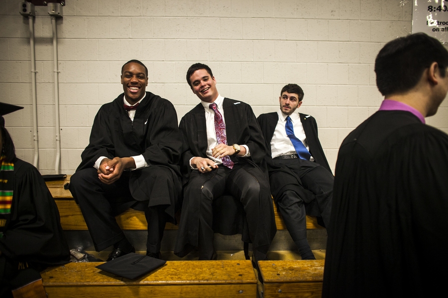 Students sit in Rockwell Cage, waiting for the ceremony procession to begin.