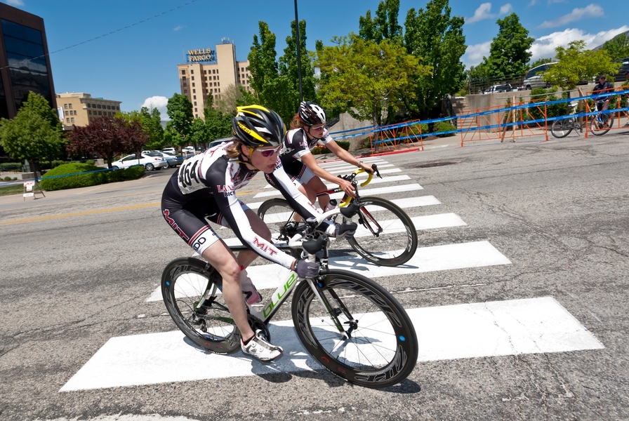 Laura Ralston (inside) and Katie Quinn (outside) broke away from the pack in the Nationals criterium around downtown Ogden, Utah, and worked together to secure a 1-2 finish with Ralston successfully defending her 2011 criterium title. Quinn placed first in the road race portion of the competition.
