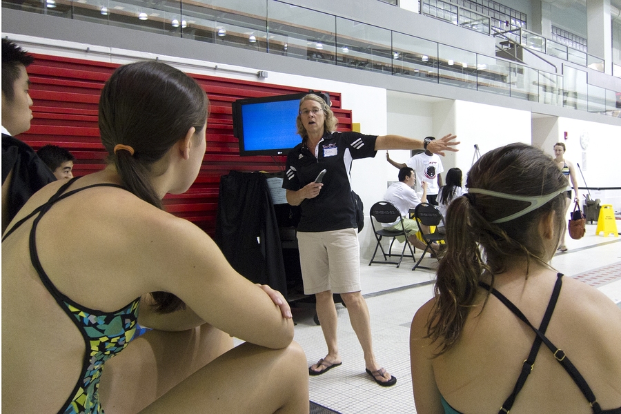 After checking in at the pool, students watch a brief video and presentation about the swim-test procedures. Staff from the Department of Athletics, Physical Education and Recreation (DAPER) manage the test sessions with help from faculty-coaches and student Orientation leaders.