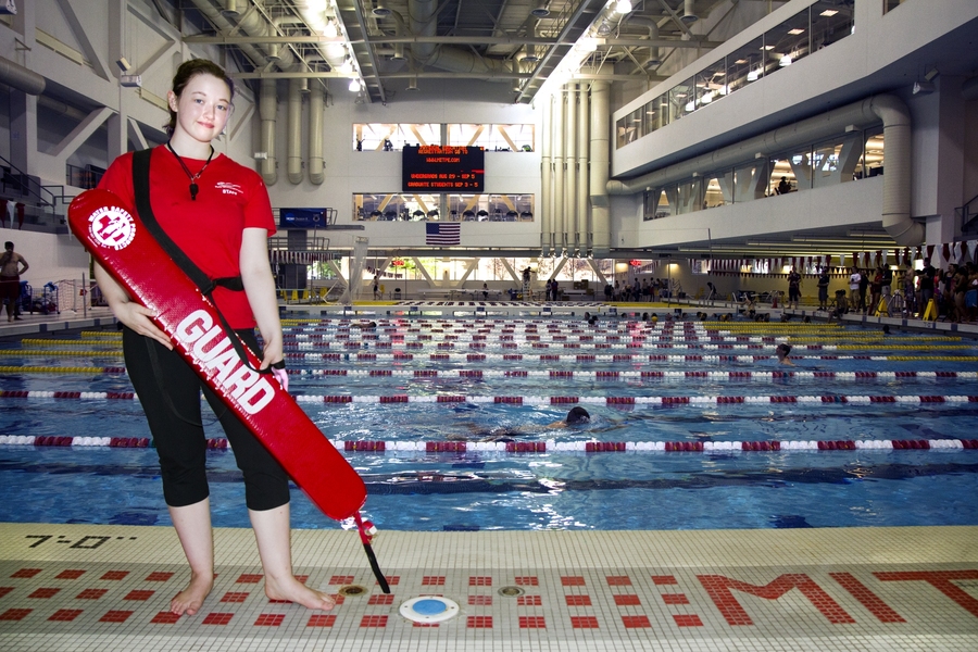 Lifeguards are stationed throughout the pool to ensure safety. Alana Parkinson walked alongside swimmers in the slow lane, to give them confidence that a helping hand was nearby if they needed it.