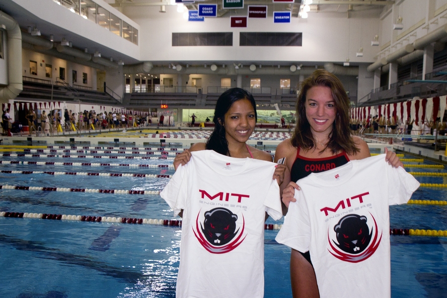 New freshmen Nihala Thanikkal and Olivia Basil show off the T-shirts students receive for successfully completing the MIT swim test. By taking care of the requirement at Orientation, they can focus on the tests they'll take in the classroom.