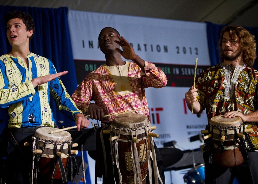 Members of Rambax, a student drum and dance ensemble, perform at the ceremony.