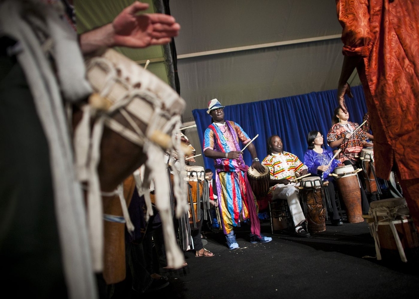 Members of Rambax, a student drum and dance ensemble, perform at the ceremony.