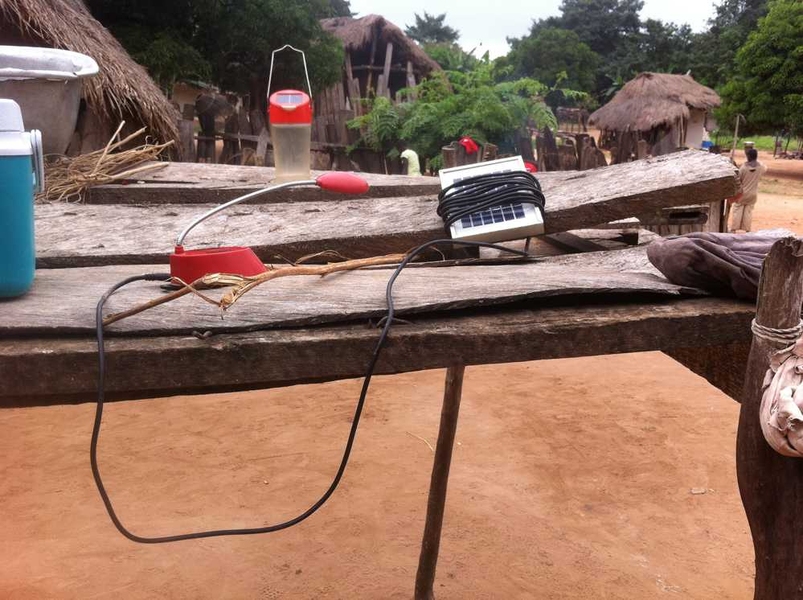 Charging solar lanterns in Ghana as part of an technology evaluation program.