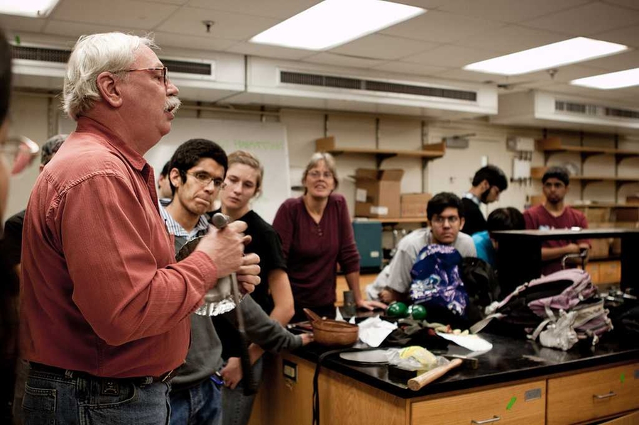 Fay Butler demonstrates some cold forming metal techniques to the 'D-Lab: Discovery' class.