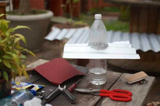A prototype solar bottle lamp to be implemented in a Techo construction project to increase the amount of light inside houses in <i>favelas</i>.