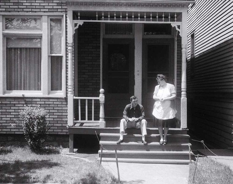 Chuck Walley and his mother, Emily, on their front porch in the late 1940s.