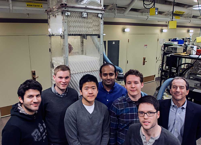 The team responsible for developing the improved HDH desalination system, seen in front of a prototype of the system. From left to right, they are:  Karim Chehayeb, Gregory Thiel, Steven Lam, lead researcher Prakash Narayan Govindan, Max St. John, Ronan McGovern and the senior member of the team, Professor John Lienhard.