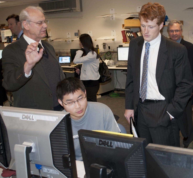 U.S. Rep. Joseph Kennedy III (right) observes data collected by graduate student Cornwall Lau as PSFC Director Miklos Porkolab explains the importance of student contributions to fusion research.