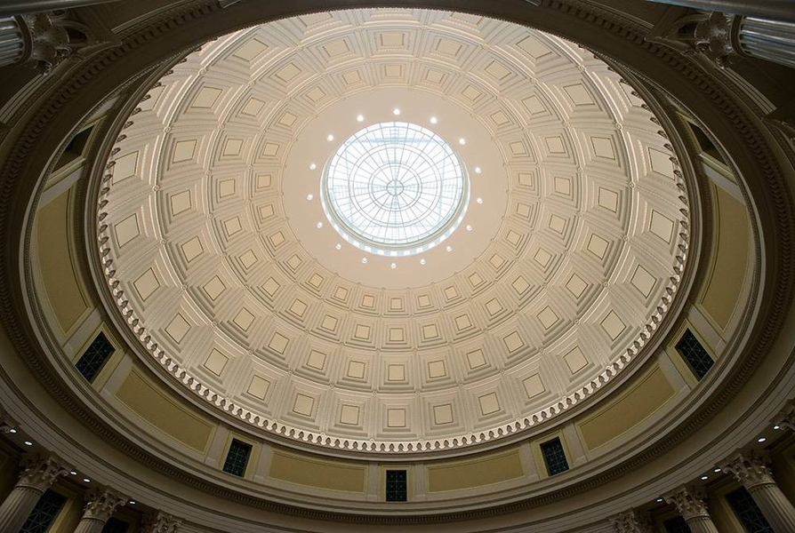 LED lights, hidden behind decorative acanthus leaves, highlight the dome's grandeur.