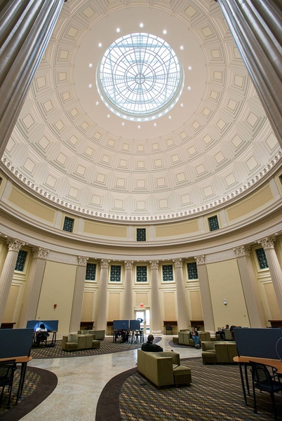 The rectangular recesses in the dome are fitted with acoustic panels that help soften echoes. A sound-mitigation system was installed in the reading room to help soften ambient noise.