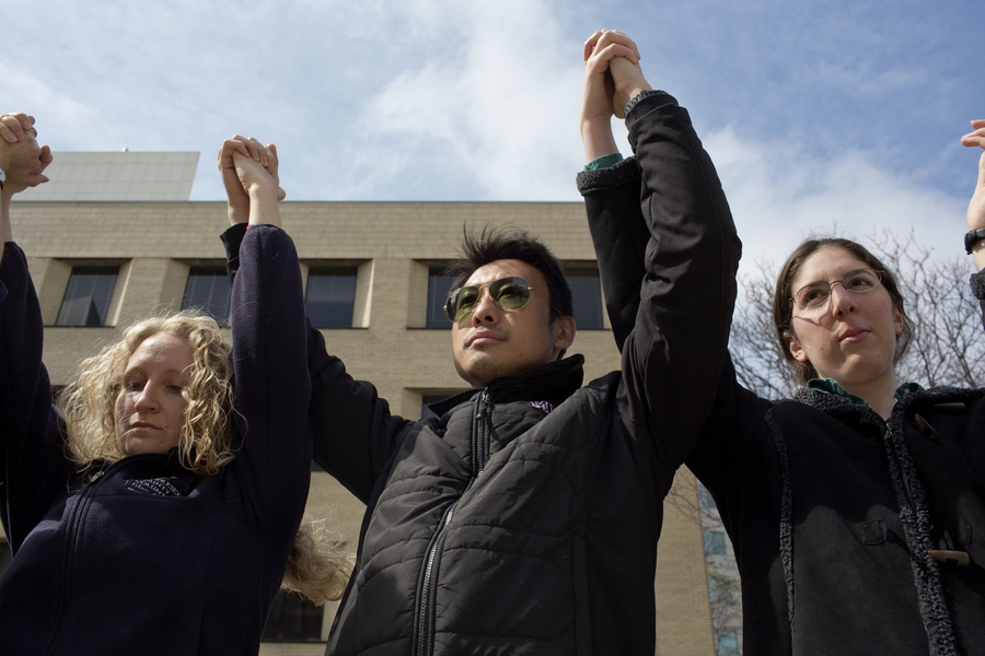 On Monday at 2:50 p.m., hundreds of people — members of the MIT community and others — formed a human chain down Vassar Street.