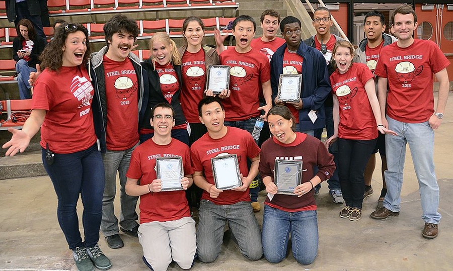 The MIT Steel Bridge team placed first in four categories — display, lightness, efficiency and economy — and won first place overall. Organizers of the event, which was held at MIT, were graduate students Leonidia Garbis (far left) and Matthew Pires (fourth from right). 