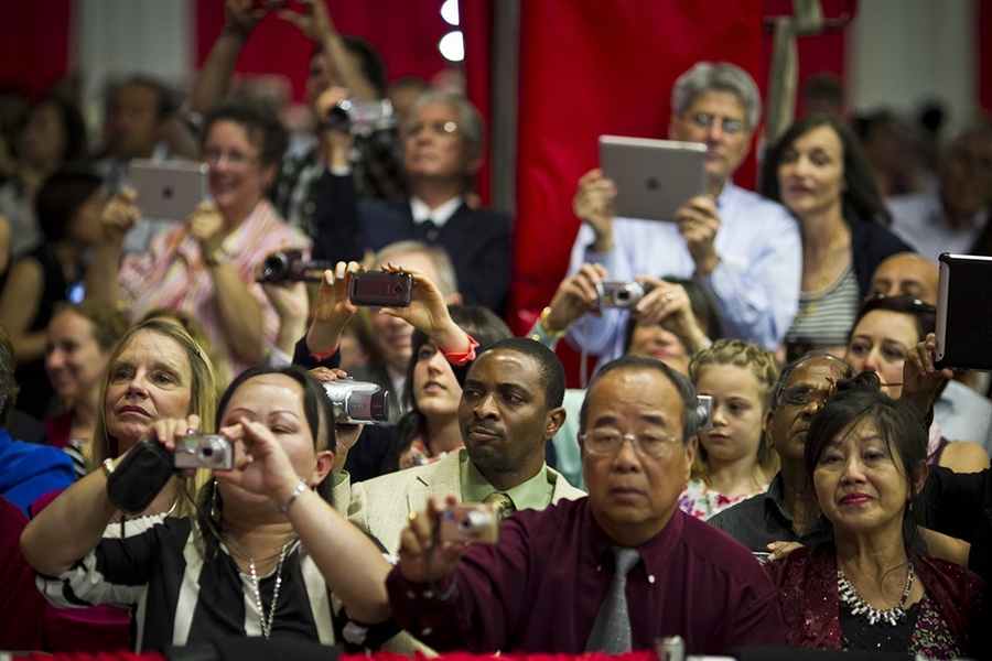 Audience members captured the moment on their smartphones, digital cameras and tablets.