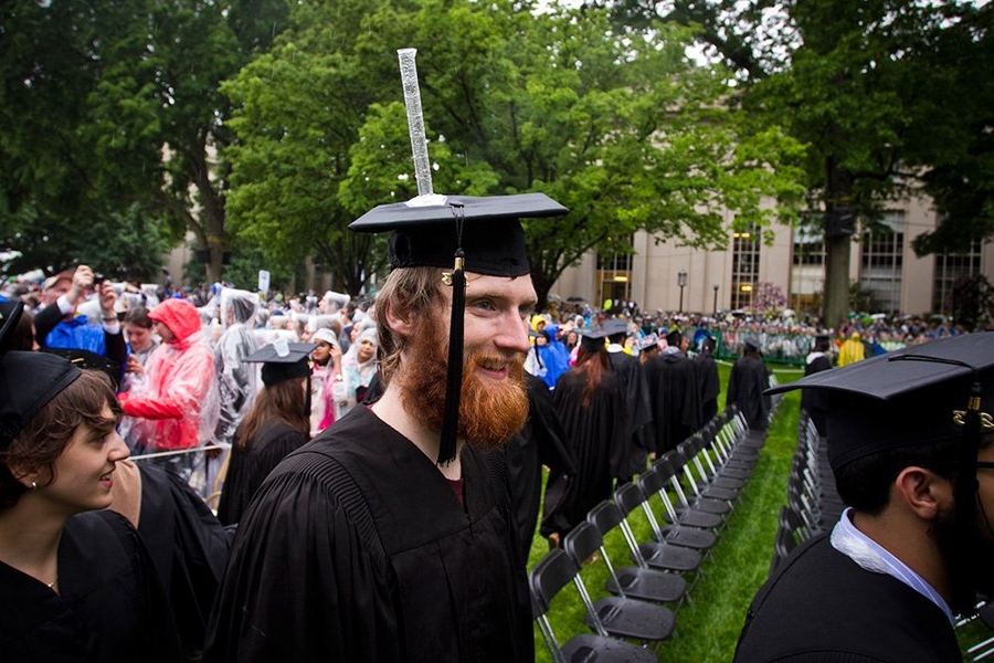 One graduate affixed a graduated cylinder to his mortarboard, likely to keep track of the rainfall totals.