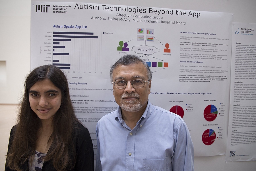 Elaine McVay '15, an undergraduate majoring in electrical engineering and computer science, posed with MIT professor Mriganka Sur, the director of the Simons Center. McVay's project analyzed 430 apps used by autistic children and proposed that data gleaned from games and other apps could facilitate an autistic child's learning experience.
