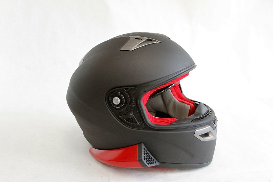 MotoCyclone addresses poor airflow and temperature regulation in motorcycle helmets by designing an affordable external vent attachment. Team members are Tyler Carlin, David Chou, Joseph Falvella, Robert Giacomantonio, Kaia Lai, Emily Obert, Vrushank Phadnis, and Nicholas Wheat. 