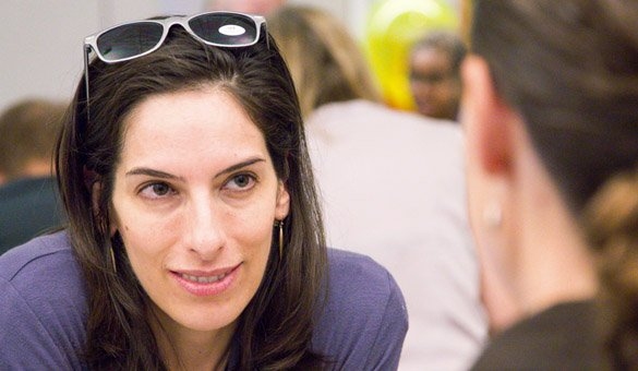 Associate Professor Natasha Dow Schüll, Program in Science, Technology and Society, with a student at the expo.