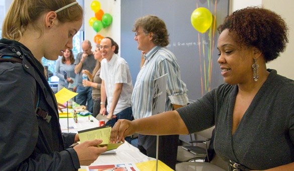 Daria Johnson, Undergraduate Academic Administrator for MIT Literature, talking with students at the expo 