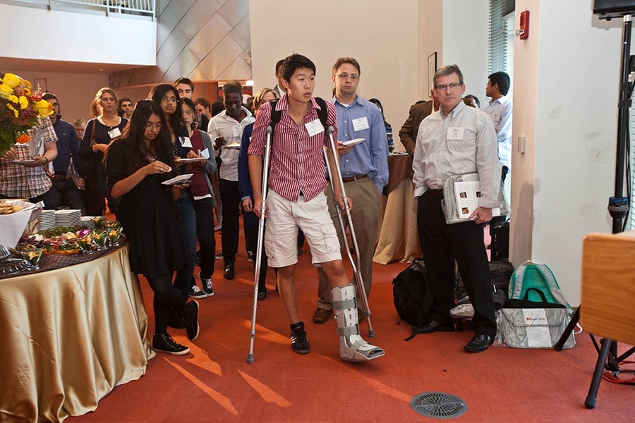 The crowd at the SuperUROP kickoff reception gathered for brief remarks by event speakers. 