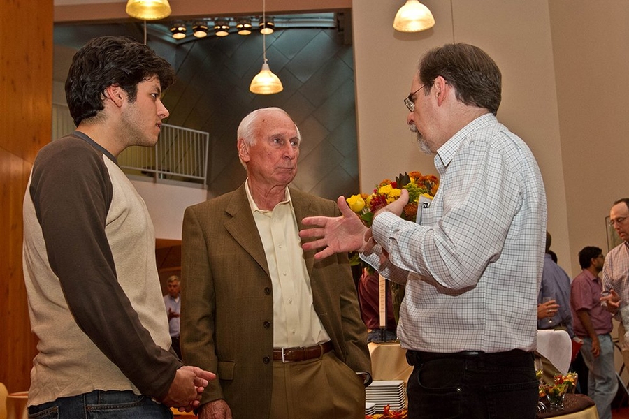 Inaugural SuperUROP student Gustavo Goretkin, who spoke at the reception, joined a discussion with his advisor, Professor Tomas Lozano-Perez and Ray Stata.  