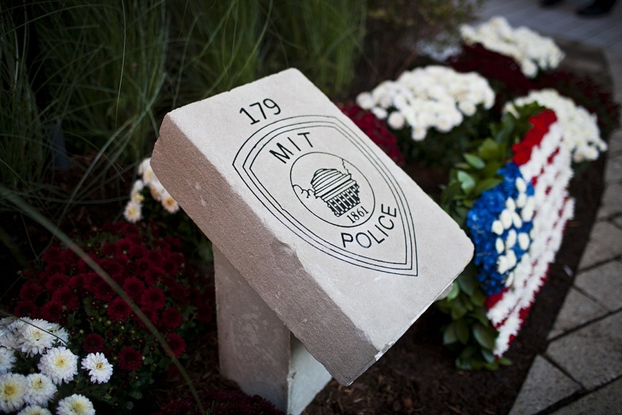 The new memorial stone — which sat atop MIT's Great Dome prior to its recent restoration — bears an engraving of the MIT police badge and "179," Officer Sean Collier's badge number.