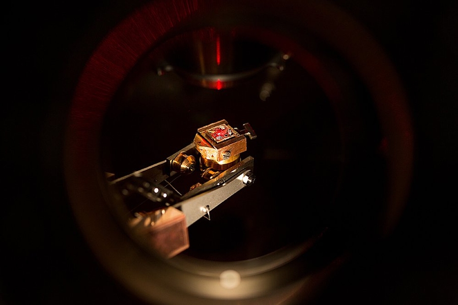 A sample of bismuth selenide, a topological insulator, is seen inside the test apparatus in Nuh Gedik's lab, ready to be studied using the team's femtosecond laser system and electron spectrometer.