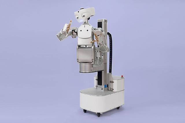 Shown here is Meka Robotics' M1 Mobile Manipulator, a robotic two-armed humanoid designed to lift and carry objects. It has arms equipped with strong grippers and series elastic actuators (so the arm slows down upon human touch), a pan-tilt head with digital cameras for sensing objects, and an omnidirectional platform with a mechanical vertical lift. 