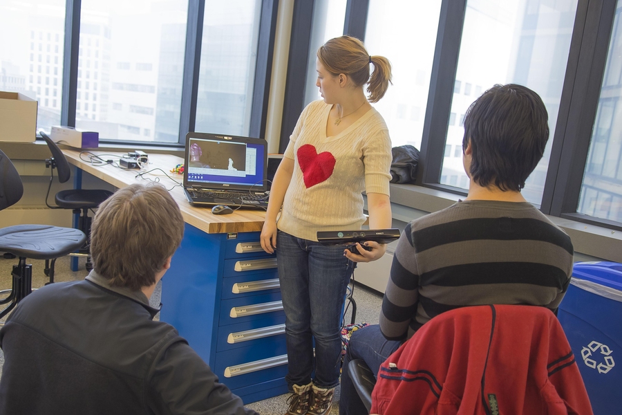 Professor Wojciech Matusik (left) works with students to develop 3-D printed objects in 6.S079 Computational Fabrication. 