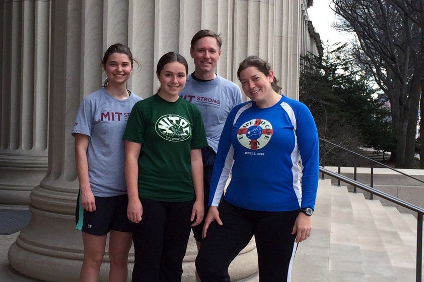 Members of MIT Strong stop on the steps of MIT’s 77 Massachusetts Ave. entrance during a training run on March 29. From left: sophomore Sally Miller, Madeline Hickman ‘11, Tom Gearty, and Rachel DeLucas ‘03. Miller, Hickman, and DeLucas are members of the MIT Outing Club; Gearty serves as editorial director in MIT Resource Development. 