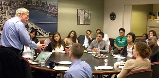 Bill Bonvillian talks with a group of MIT students.