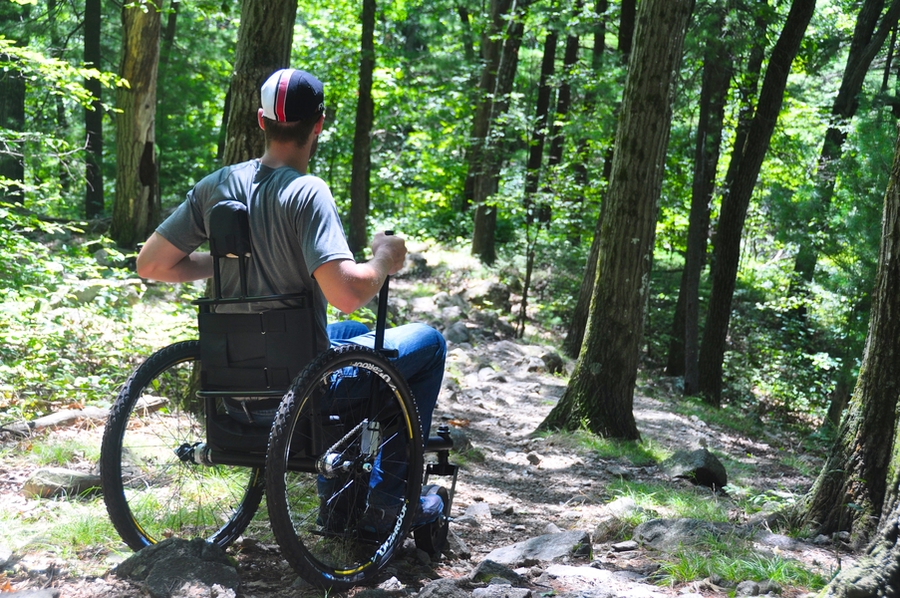 The Freedom Chair enables mobility on uneven terrain.