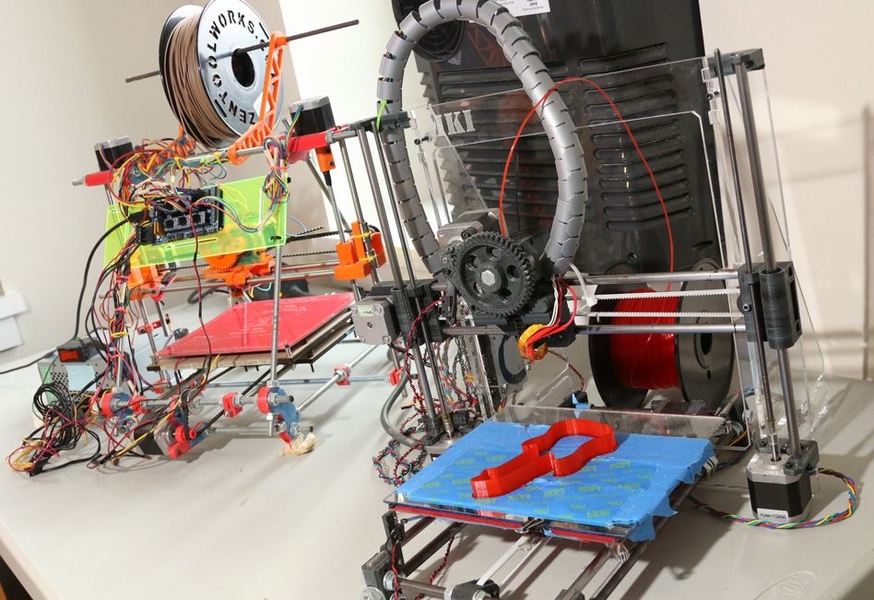 Two RepRap 3-D printers built by Spielberg.