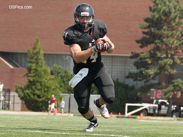 Led by a record-breaking performance by senior running back Justin Wallace (pictured), the Engineers scored a dramatic 55-37 victory over the Maine Maritime Academy in a New England Football Conference clash. The win clinched MIT's first-ever NEFC title as well as its first NCAA playoff berth.