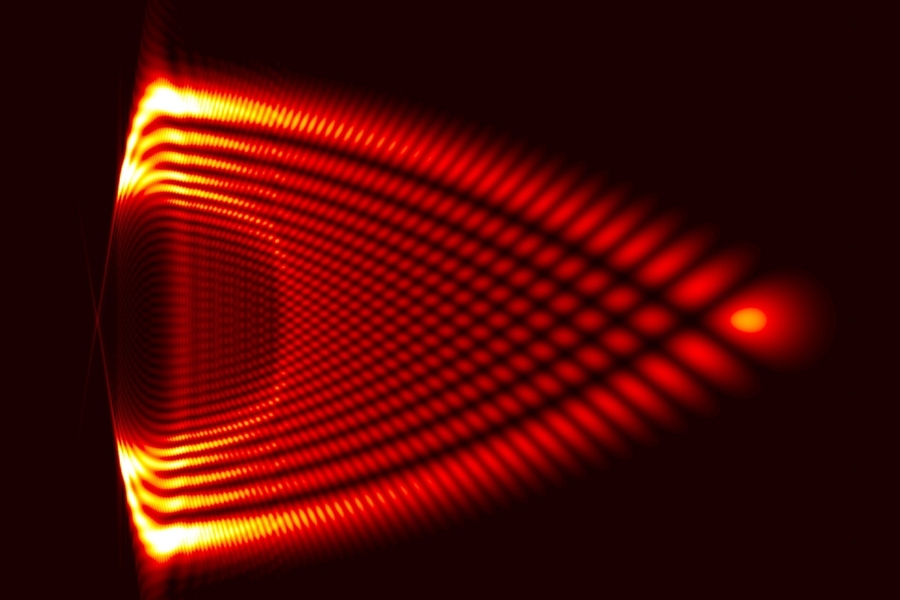 This image shows the spatial distribution of charge for an accelerating wave packet, representing an electron, as calculated by this team’s approach. Brightest colors represent the highest charge levels. The self-acceleration of a particle predicted by this work is indistinguishable from acceleration that would be produced by a conventional electromagnetic field.