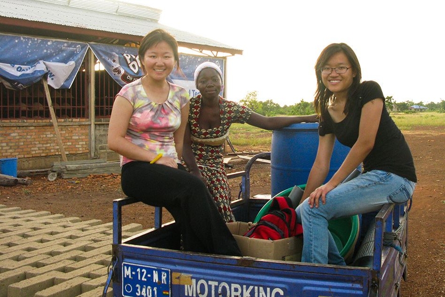 Xing and Oh shop for local materials with one of their local partners, Zainab. 