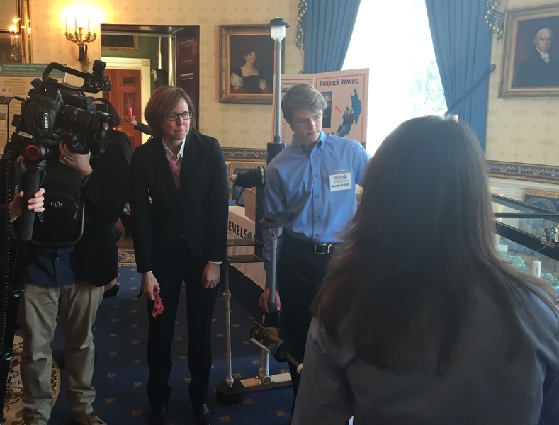 United States Chief Technology Officer and MIT alumna Megan Smith inspects the Lemelson-MIT InvenTeam dock.