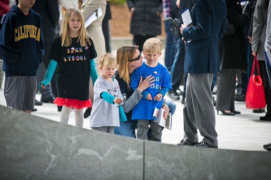 Attendees gathered around and inside the newly opened Collier Memorial at the conclusion of today's ceremony.