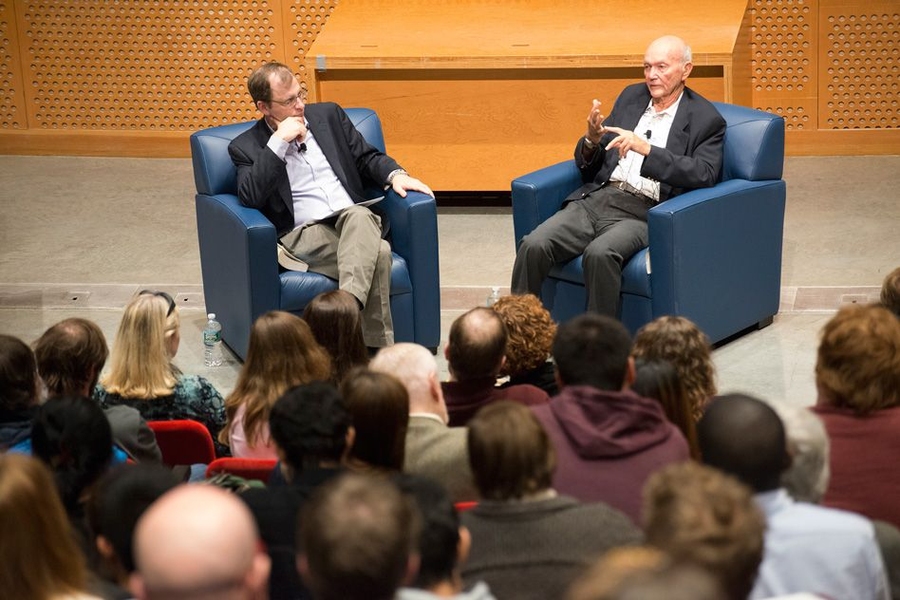 David Mindell (left), of MIT's Department of Aeronautics and Astronautics, converses with retired astronaut Michael Collins.