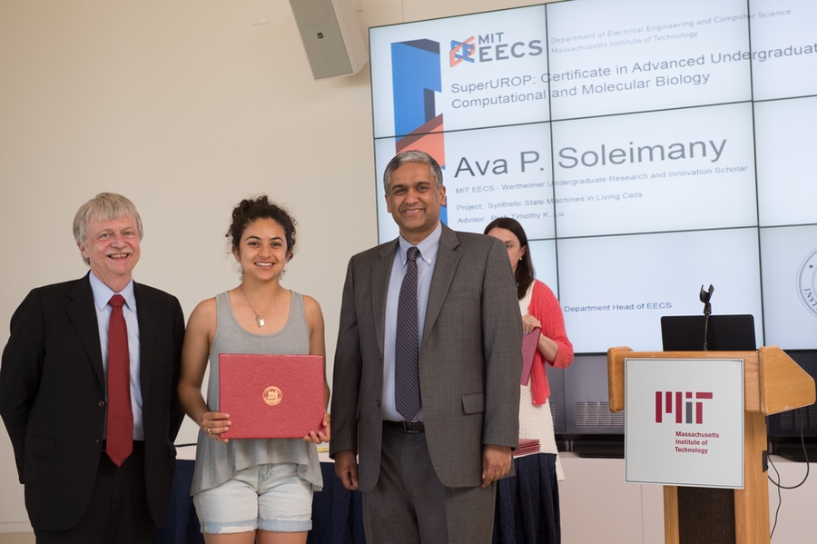 Each SuperUROP graduate — including Ava Soleimany (center) — received a certificate from professors Dennis Freeman (left) and Anantha Chandrakasan.