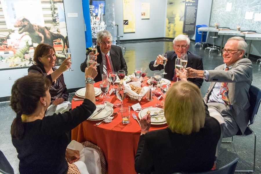 Anne Harrington, Philip Khoury, Mark Epstein, John Durant (facing camera, left to right), and others toast the announcement of Epstein’s gift to endow the directorship of the MIT Museum.