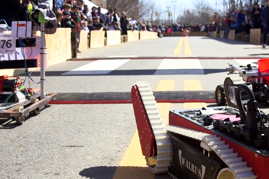 Robots took their marks at the starting line of a machine-only race to benefit an MIT alumna-founded health organization.
